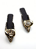 Effortlessly elevate your daily style with our Chic Leopard Print Flat Mules. These elegant flats feature a striking floral patchwork design, bold leopard print, and gold hardware for a touch of luxury. With a comfortable flat heel and trendy metal buckle, these mules are the perfect way to add a touch of sophistication to any outfit.