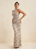 Turn heads this season in our stunning leopard print halter maxi dress! This showstopper features a flattering halter neckline and flowing maxi silhouette that moves beautifully with every step. The bold leopard print adds instant edge and sophistication to your summer wardrobe. Whether you're heading to a garden party, beach wedding, or night out with friends, this versatile piece transitions effortlessly from day to evening. Comfortable, chic, and undeniably fabulous—your new go-to dress for making a stat