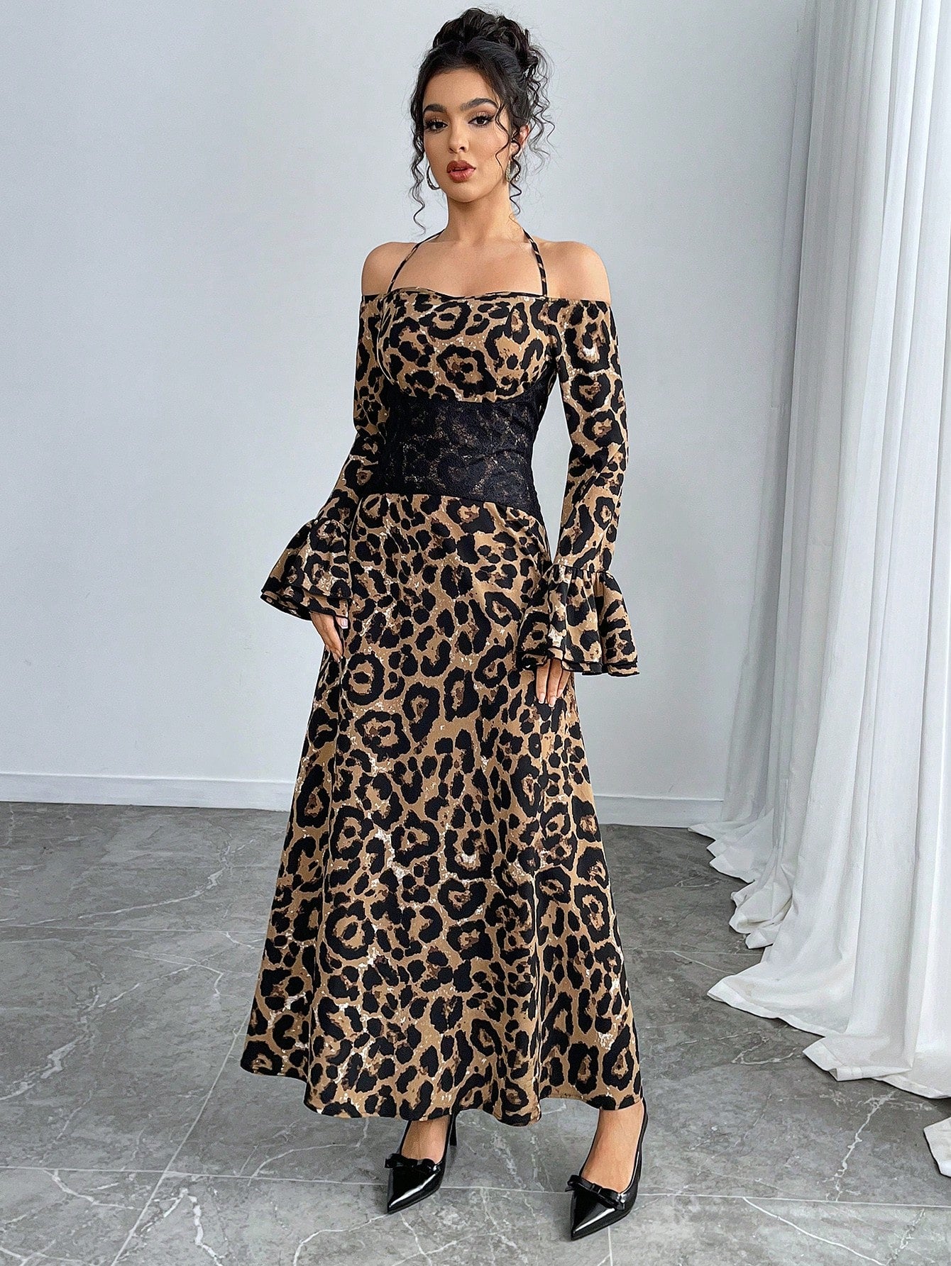 Unleash your wild side with our Chic Leopard Print Dress! This halterneck dress features a delicate lace contrast and playful trumpet sleeves, perfect for making a statement at any occasion. Embrace your fierce and fashionable self in this must-have dress!
