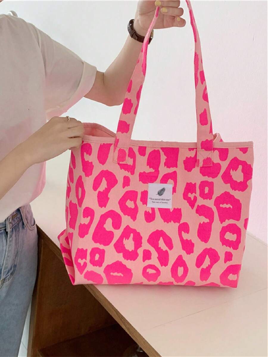 Elevate your everyday carry with this chic leopard print shoulder tote. Crafted from luxurious 100% viscose, this oversized bag features a ruched design and all-over print pattern that adds effortless style to any outfit. The spacious interior and secure zipper closure make it perfect for work, travel, or weekend getaways. Dual handles ensure comfortable carrying, while the casual aesthetic works seamlessly from day to night. An ideal companion for vacation season or a thoughtful gift for the style-consciou