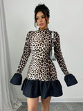 Elevate your autumn and winter style with our Chic Leopard Print Long Sleeve Mini Dress. Featuring a cinched waist and long sleeves, this dress is perfect for layering during the colder months. The sophisticated leopard print adds a touch of fun to any outfit. Stay on-trend and stylish with this versatile must-have piece.