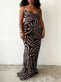 Unleash your wild side with this stunning leopard print maxi dress that's equal parts sophisticated and fun. The elegantly draped neckline adds a touch of refinement, while the flowing silhouette flatters every figure. Perfect for vacation getaways or elevating your everyday wardrobe, this versatile piece transitions seamlessly from beach days to dinner dates. The timeless leopard pattern never goes out of style, making it a go-to favorite you'll reach for again and again. Comfortable, chic, and undeniably 