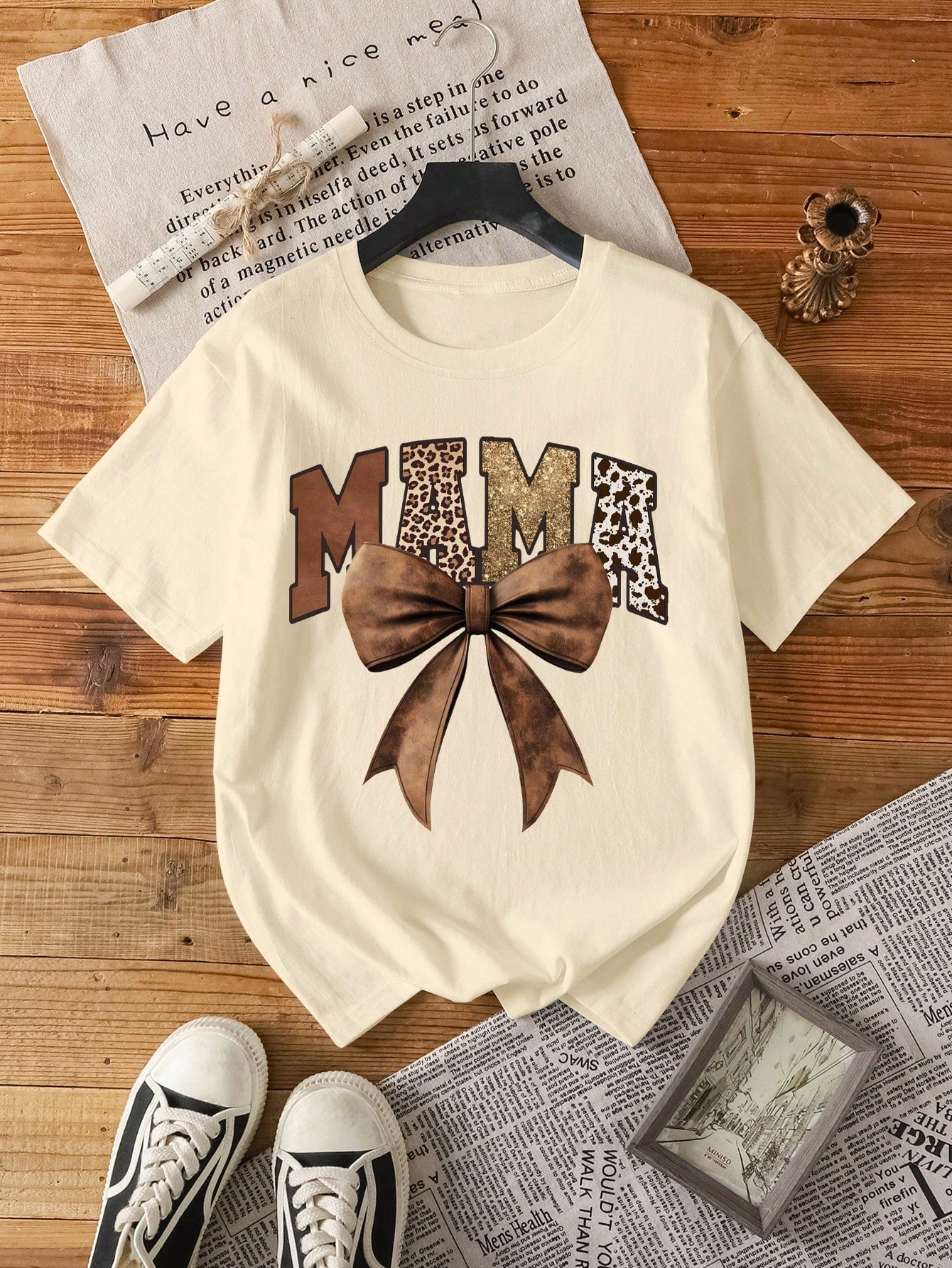 Stay stylish and comfy in our Chic Leopard Print Mom T-Shirt with Retro Bow Design for Women. The playful retro bow design adds a touch of fun to this trendy leopard print shirt. Perfect for all the cool moms out there! (Moms totally rule!)