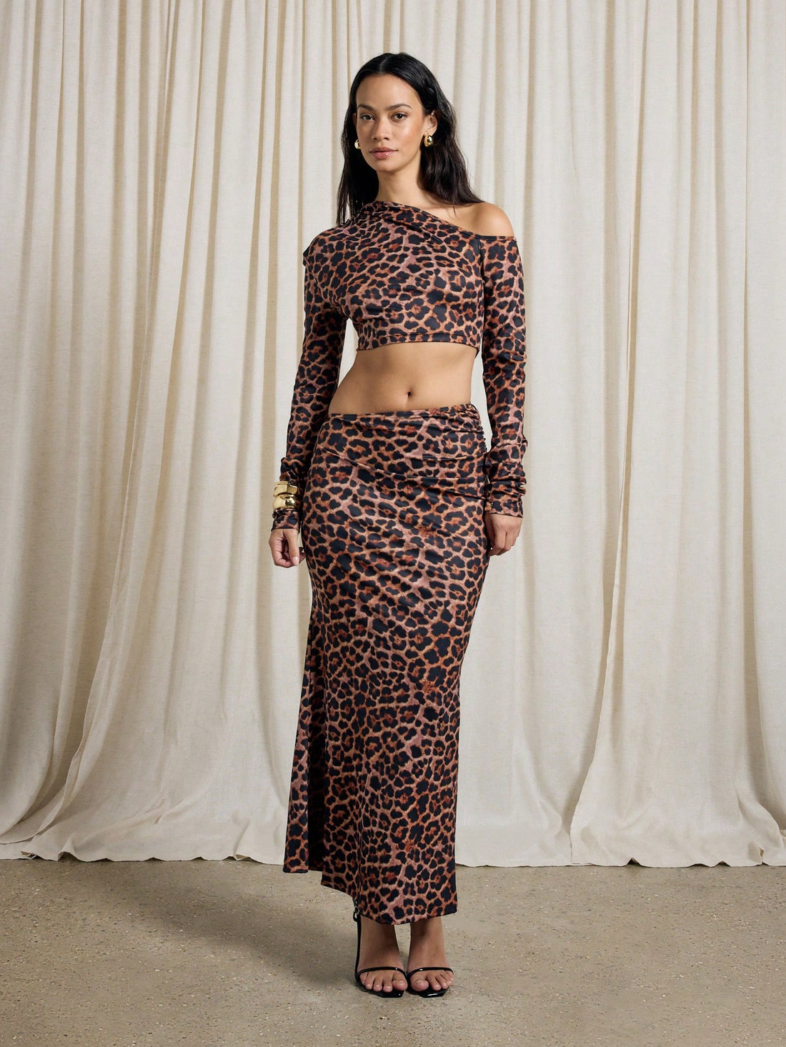 Make a bold statement this season with our Chic Leopard Print One-Shoulder Two-Piece Set. This playful ensemble features a striking leopard pattern that commands attention, paired with a trendy one-shoulder silhouette for effortless sophistication. The two-piece design offers versatility—wear together for maximum impact or mix and match for fresh looks. Perfect for autumn-winter evening parties, festivals, and nights out, this set combines wild style with wearable elegance. Embrace your fierce side and turn