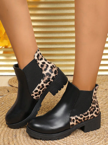 Elevate your style with our Chic Leopard Print & PU Leather Ankle Boots. The versatile chunky heels are perfect for any season, providing both fashion and function. With a trendy leopard print design and durable PU leather material, these boots are a must-have for any wardrobe.