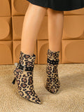 Elevate your look with these chic leopard print pointed toe high heel boots featuring a stylish metal buckle. Look and feel fierce with these eye-catching boots that add a touch of edginess to any outfit. Perfect for a night out or a day at the office.