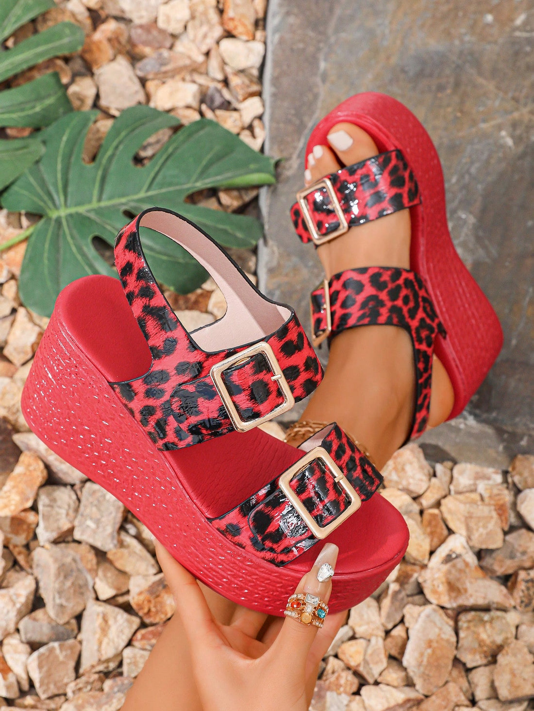 Unleash your inner fashionista with our Chic Leopard Print Red Wedge Platform Sandals. Perfect for summer, these peep toe high heels add a touch of wild to any outfit. Elevate your style with these trendy kicks.
