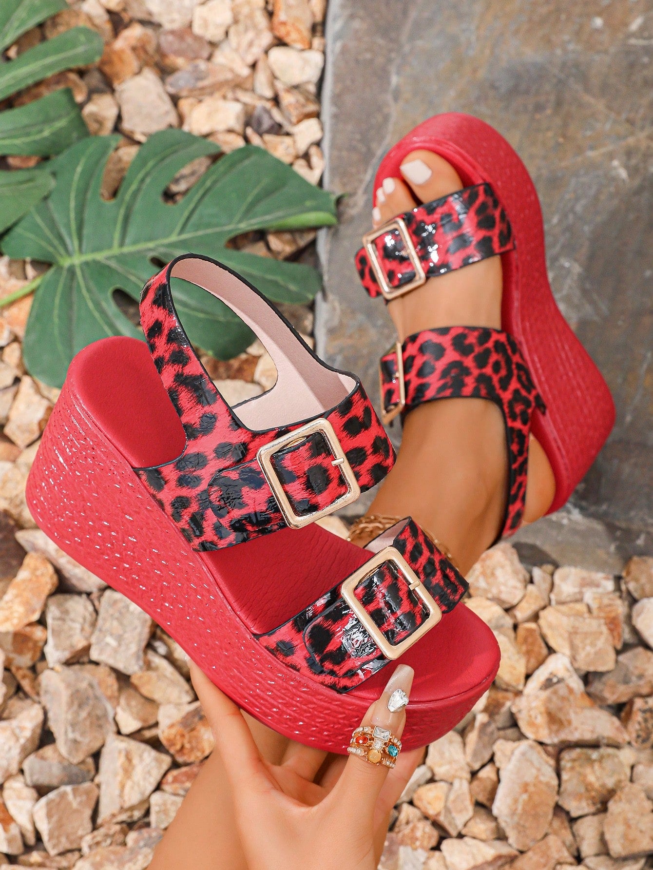 Unleash your inner fashionista with our Chic Leopard Print Red Wedge Platform Sandals. Perfect for summer, these peep toe high heels add a touch of wild to any outfit. Elevate your style with these trendy kicks.