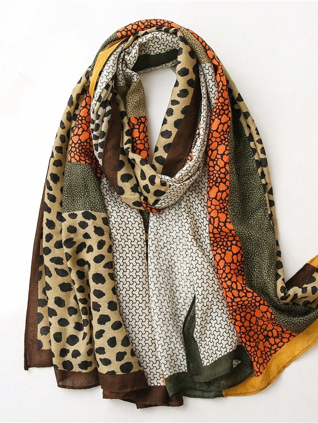 Elevate your style with our Chic Leopard Print Scarf. This versatile shawl offers both breathability and warmth, making it the perfect accessory for any season. Its eye-catching print adds a touch of sophistication to any outfit. Express your unique fashion sense with this must-have scarf.