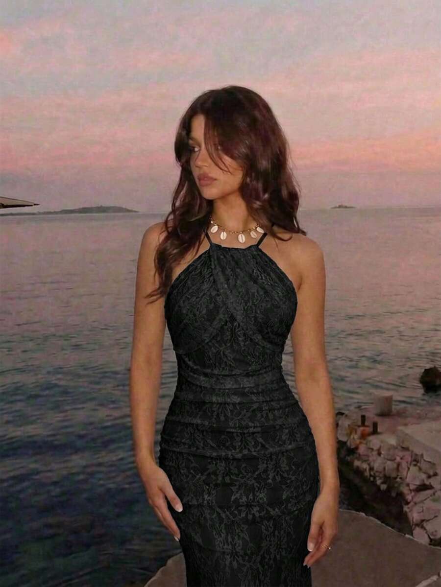 Black lace halter mermaid maxi dress with ruched bodice and fishtail hem