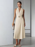 Step into effortless style with this chic sleeveless shift dress, crafted in a breezy linen-look fabric. The playful neck tie waist adds a flirty touch, letting you customize your silhouette with ease. Perfect for sunny days or casual outings, this dress combines comfort and charm for a look that’s both relaxed and refined.
