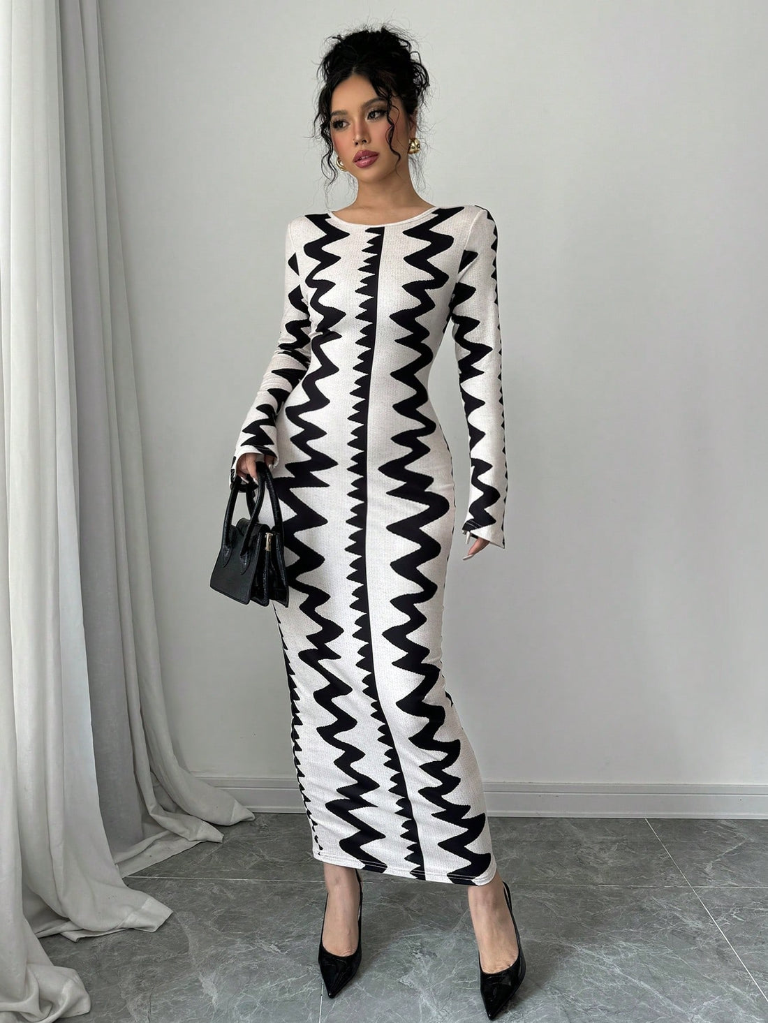 Slip into effortless elegance with this stunning bodycon maxi dress, designed to hug your curves in all the right ways. The long sleeves and allover print deliver that perfect blend of coverage and eye-catching style, making it your go-to piece for fall gatherings, date nights, or whenever you want to feel absolutely fabulous. Versatile enough to dress up with heels or keep casual with sneakers, this chic number proves that comfort and confidence can absolutely coexist. Your new favorite dress is calling!