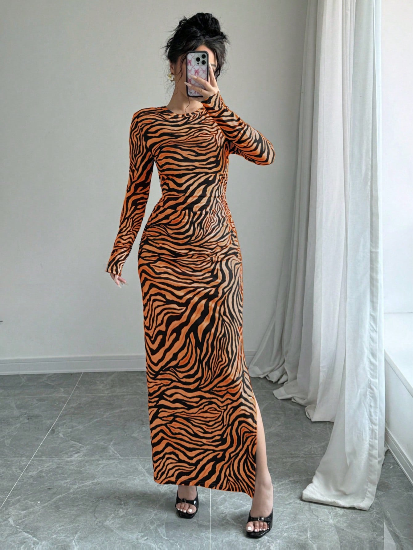 Elevate your style with our Chic Long Sleeve Knitted Dress. Crafted with effortless elegance in mind, this dress will keep you looking and feeling chic all day long. With its long sleeves and soft knit fabric, you'll stay comfortable while exuding sophistication. Perfect for any occasion, from the office to a night out.