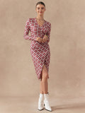 Effortlessly elegant, this chic knitted dress features a stylish plaid print that adds a touch of playful sophistication. With a flattering long sleeve design, this dress is perfect for any occasion. Embrace your quirky side with this unique and fashionable piece that will make you stand out from the crowd.
