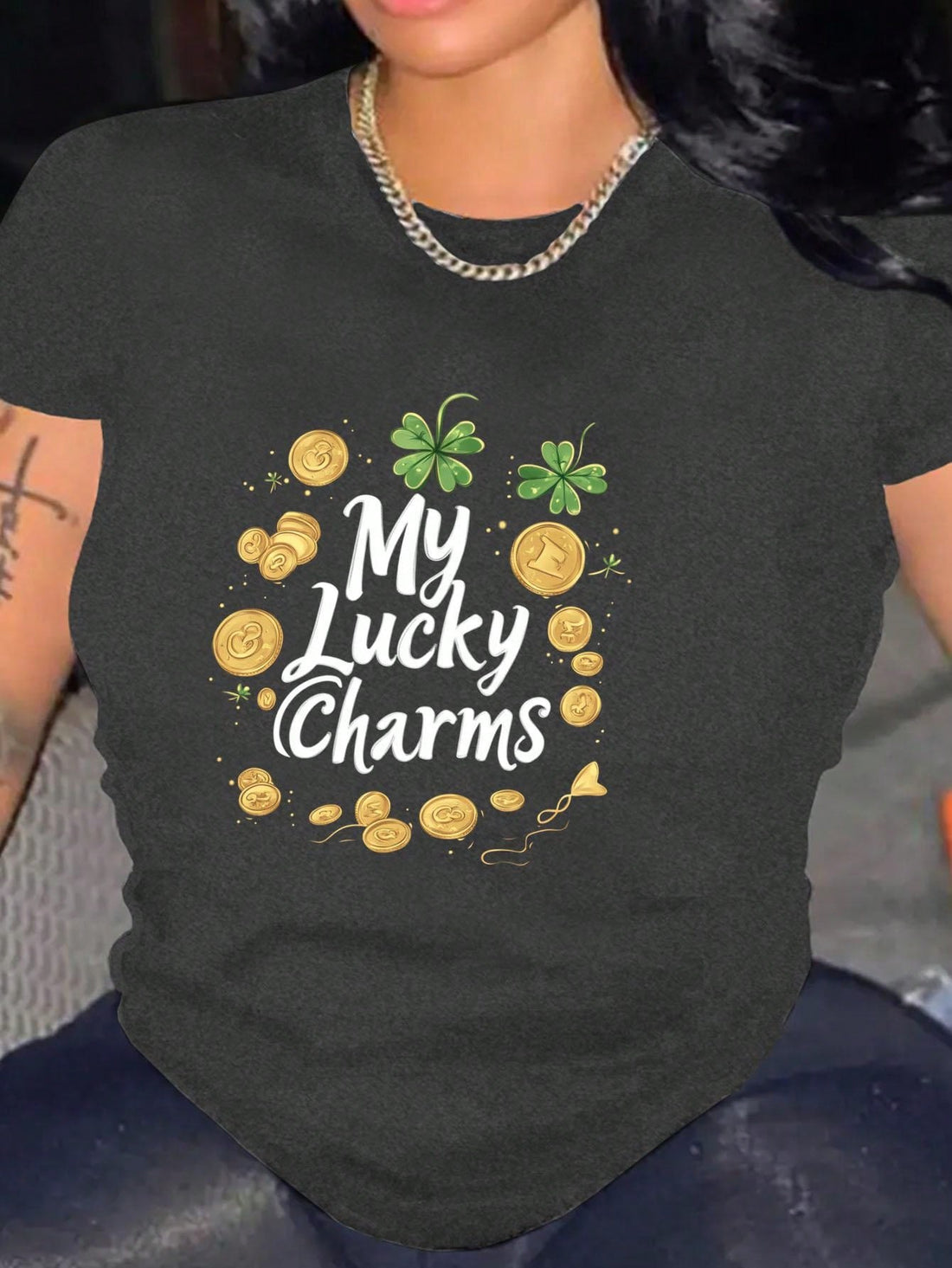 Introducing our Chic Lucky Clover Graphic Tee, making you feel light and stylish all year round! This casual top features a playful print with a lucky clover design, perfect for bringing some fun to your wardrobe. Wear it in any season and bring some good luck to your day!