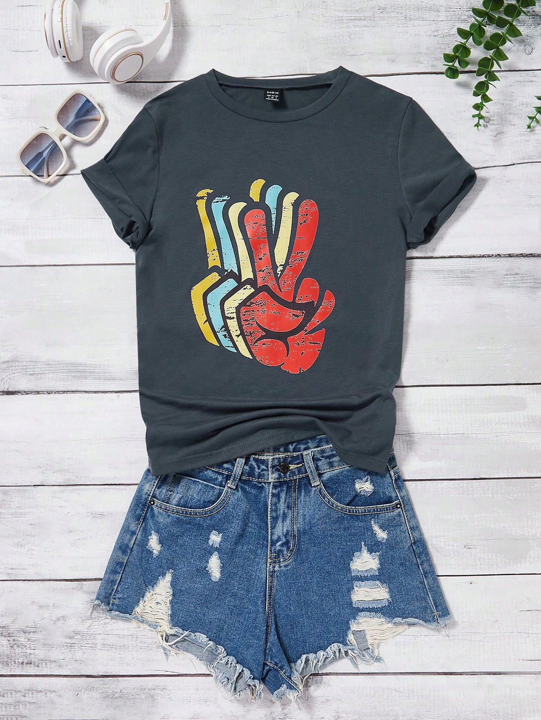 Effortlessly chic and stylish, the Lune Graphic Tee is perfect for those looking to rock a casual yet trendy look. With its unique graphic design and comfortable fit, this t-shirt will quickly become your go-to choice for any laid-back occasion. Stay effortlessly cool in the Chic Lune Graphic Tee.