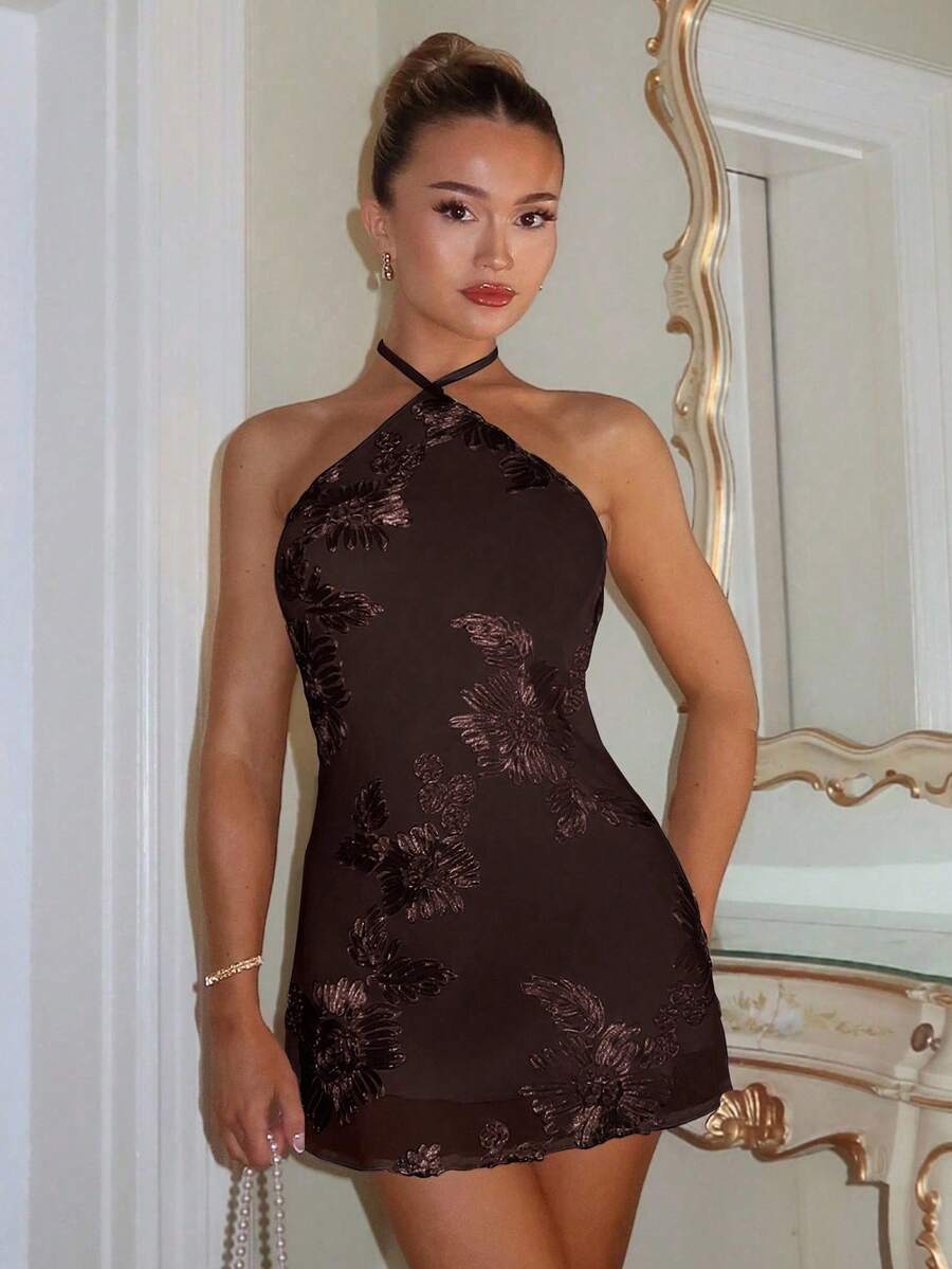 Turn heads this season in our stunning maroon backless halter mini dress—the ultimate piece for those who love bold, carefree style. The daring open back and flattering halter neckline create an effortlessly chic silhouette that's perfect for summer adventures, beach parties, or nights out. Crafted for comfort and confidence, this dress pairs beautifully with strappy sandals and minimal jewelry to let the design shine. Whether you're soaking up the sun or dancing under the stars, this maroon beauty delivers