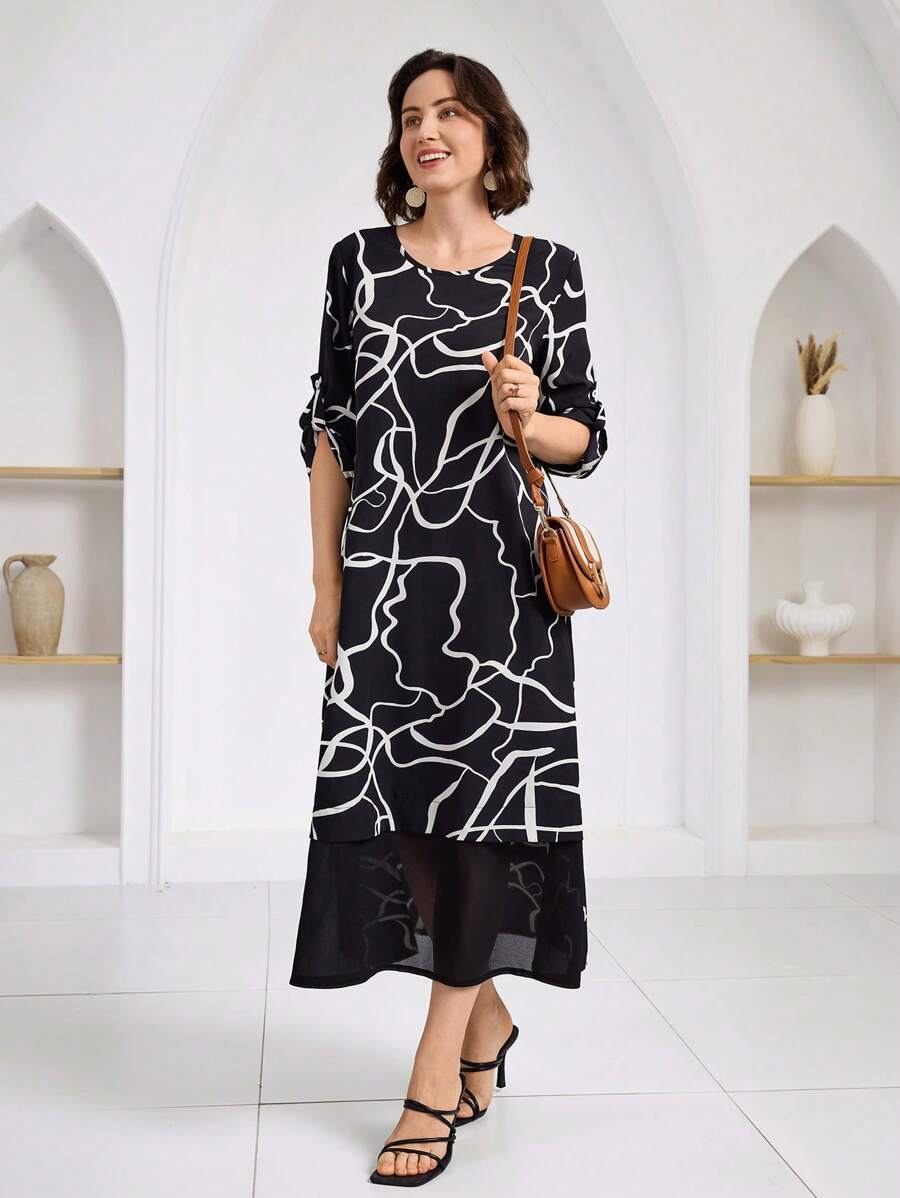 Effortlessly strut into spring and summer with this chic mid-length line print dress. Perfect for any outing, this dress exudes effortless style while keeping you comfortable. Get ready to turn heads and make a statement with this versatile dress!