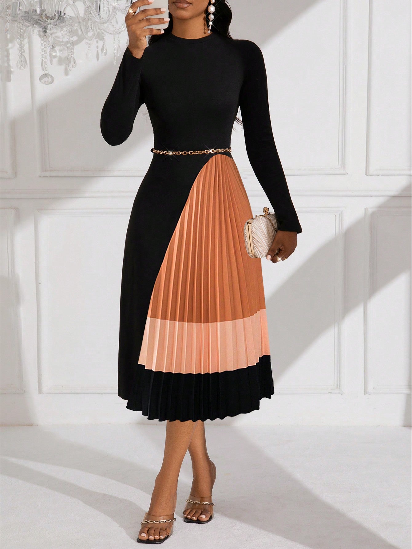 This Chic Midi Pleated Patchwork Knit Dress is perfect for the fashion-forward woman. The pleated patchwork design adds a touch of elegance to any outfit, while the knit material ensures comfort and durability. Stay stylish and comfortable with this versatile dress.