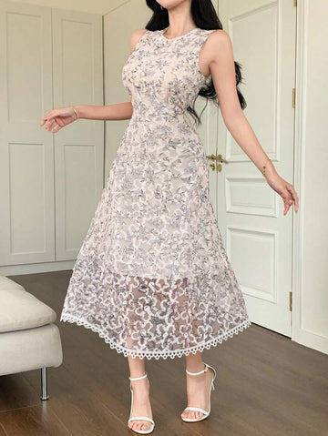 Step out in style with this chic midi dress, perfect for sunny days and warm evenings. Its sleeveless cut keeps you cool while the vibrant floral print adds a fresh burst of color to your summer wardrobe. Elegant yet playful, this dress effortlessly transitions from brunch dates to garden parties, making every outing a little more special.