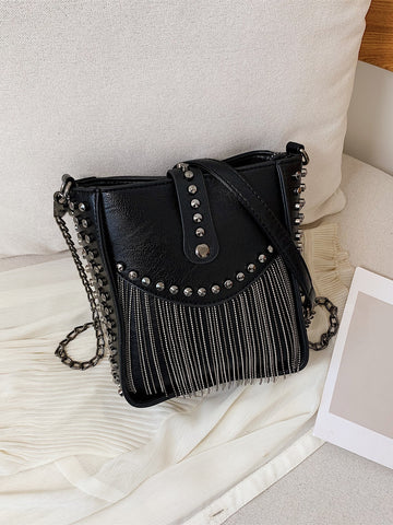 Elevate your style with our Chic Mini Fringe Studded Bucket Bag. Effortlessly add a touch of glamour with its unique studded design and trendy fringe detailing. This bag is perfect for any occasion, providing both style and convenience in a compact size. Complete your look with this must-have accessory.