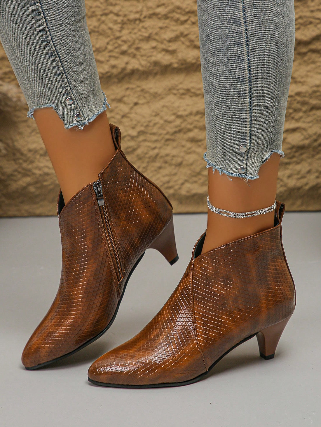 Introducing the Chic Minimalist Brown Side-Zipper Shoes - the perfect combination of style and convenience for outdoor adventures. With a sleek and effortless design, these shoes are made with high-quality materials for ultimate comfort and durability. Step out in style with these must-have shoes.