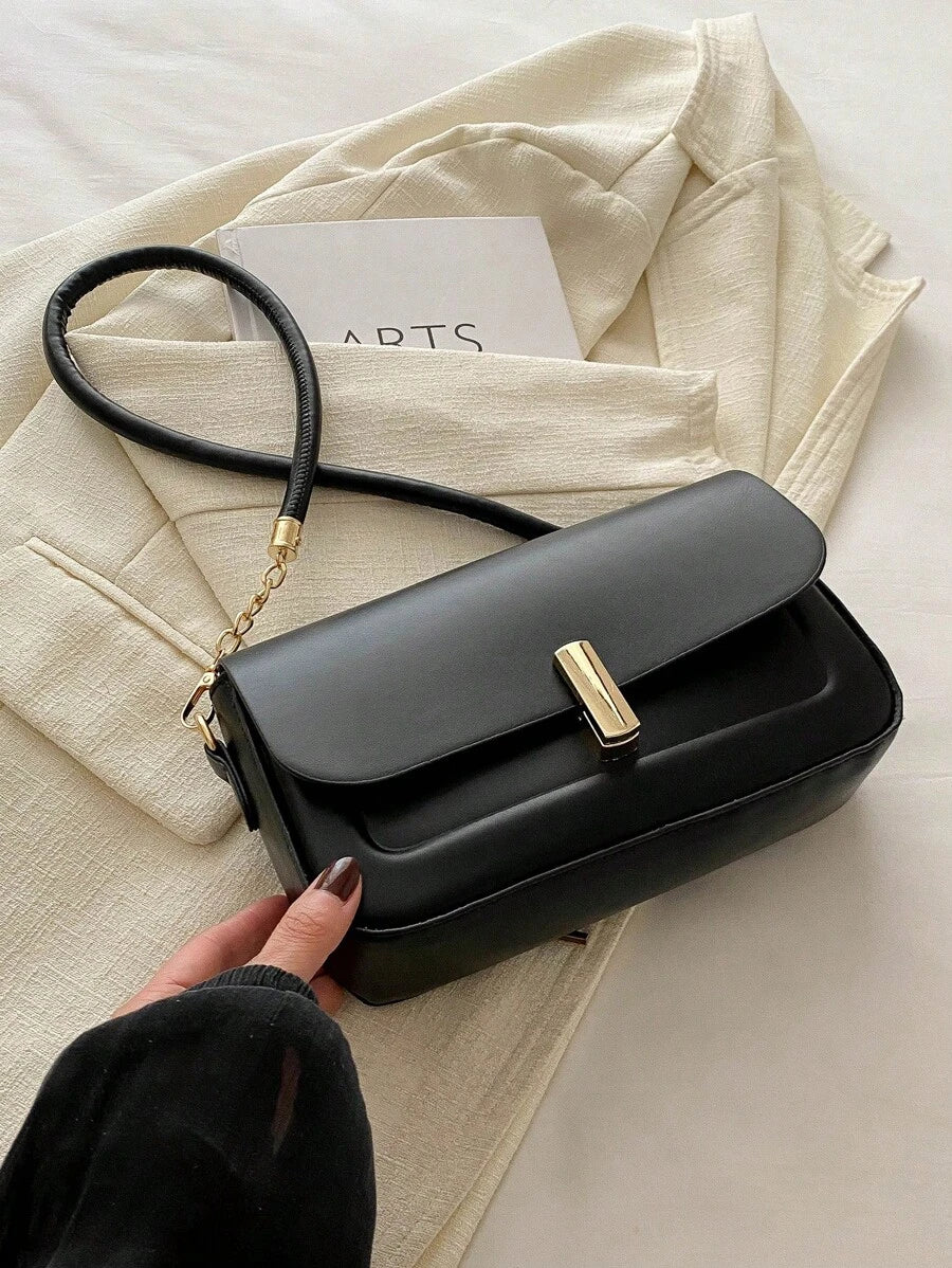 This chic minimalist chain underarm bag is your stylish sidekick for work, school, and travel adventures. Compact yet spacious enough, it keeps your essentials close with ease. The sleek design paired with a trendy chain strap adds a playful edge to any outfit. Carry confidence wherever you go!