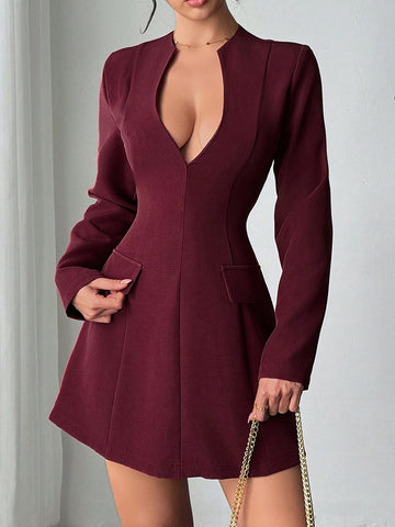 Effortlessly chic meets wonderfully wearable in this minimalist long-sleeve dress. The notched neckline adds a modern touch, while strategic cinching flatters your silhouette without trying too hard. Faux pockets keep the clean lines intact—because who doesn't love a dress that looks good and feels practical? Perfect for transitioning through fall in style, this piece pairs beautifully with sneakers or boots for an understated vibe that speaks volumes.