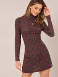This chic mock neck dress is perfect for any occasion. The ditsy floral pattern adds a touch of style, while the mock neck provides a sophisticated look. A versatile option, this dress is perfect for both casual and formal events. Make a statement with this fashionable dress.