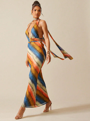 Turn heads with this Chic Multi-Color Halter Backless Maxi Dress! Featuring a playful neck tie and vibrant boho-inspired colors, it’s perfect for sunny days and breezy nights. Its flowy design keeps you comfortable while making a stylish statement wherever you go. Embrace carefree elegance with this must-have summer favorite!