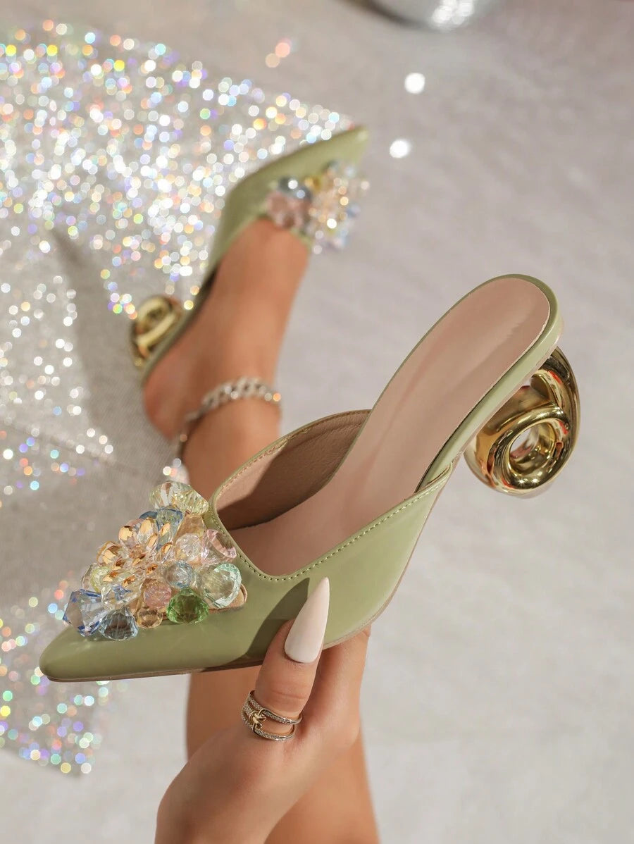 Step out in style with these chic multi-color high heel shoes, featuring a dazzling crystal glass flower design that adds a sparkling touch to any outfit. Perfect for turning heads at parties or elevating your everyday look, they bring playful elegance and vibrant charm wherever you go. Comfortable enough to dance the night away, these heels blend fashion and fun effortlessly.