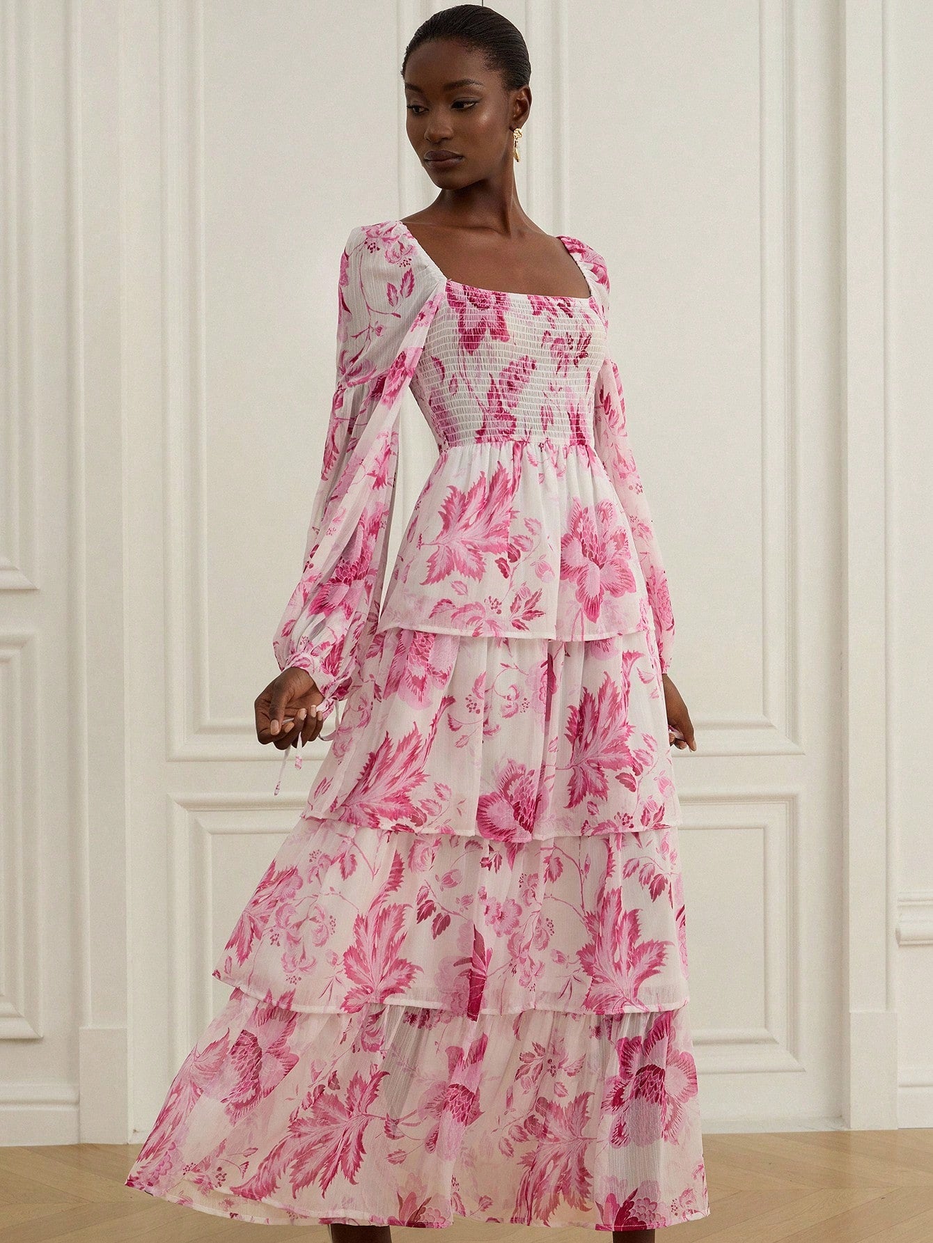 Step into fall with flair in this charming multi-layer ruffle dress, adorned with a fresh floral print that brings a burst of nature’s beauty to every step. Its playful layers create a delightful bounce with each move, making it perfect for crisp autumn days and cozy nights out. This dress pairs effortlessly with boots or flats, adding a stylish twist to your seasonal wardrobe. Embrace the season’s spirit with a look that’s as fun as it is fashionable!