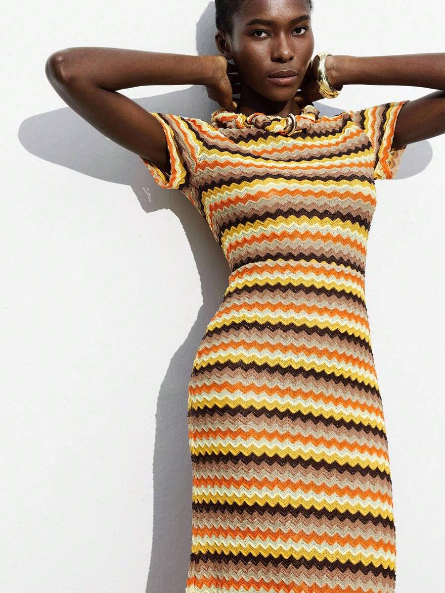 Step out in style with this Chic Multicolor Striped Maxi Dress, designed to brighten up autumn and winter days or add flair to your vacation wardrobe. Its vibrant stripes bring a playful pop of color, while the flowing maxi silhouette offers comfort and effortless elegance. Perfect for layering or wearing alone, this dress keeps your look fresh no matter the season.