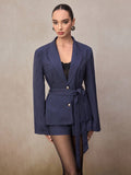 Elevate your wardrobe with this fabulous navy blue striped suit set that's equal parts sophisticated and fun! The loose-fit blazer drapes beautifully for all-day comfort, while the A-line shorts add a modern twist to classic tailoring. Mix and match these pieces with your favorite tops and accessories, or wear them together for an instant polished look. Perfect for brunch dates, office days, or whenever you want to feel effortlessly chic. This two-piece ensemble proves that style doesn't have to sacrifice c