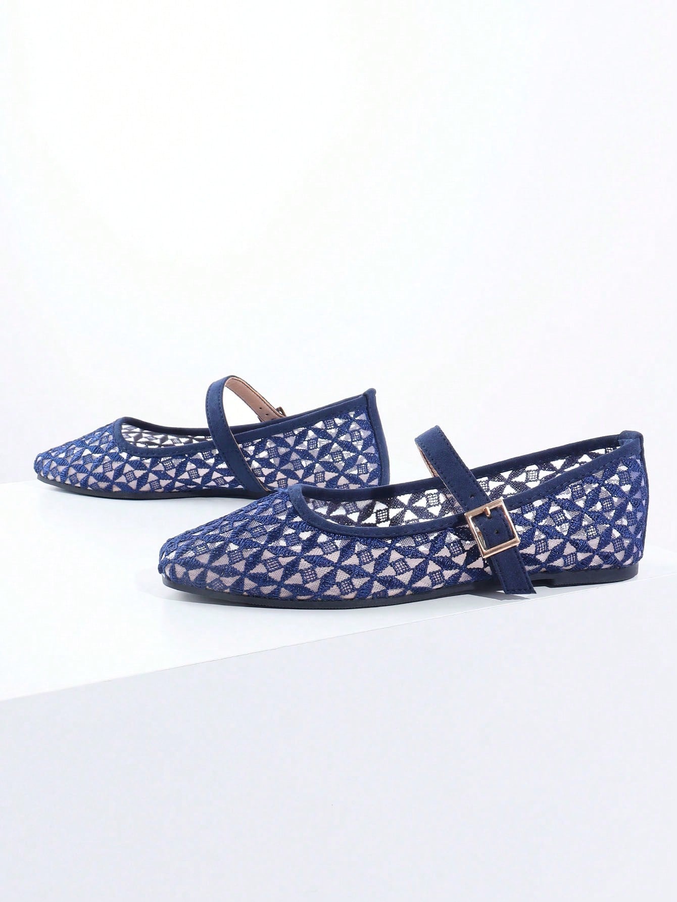 Effortlessly elevate your style with our Chic Navy Blue Woven Slip-On Flats. The square toe adds a touch of modernity, while the slip-on design provides convenience and comfort. Perfect for any occasion, these flats are versatile and stylish, making them a must-have for your wardrobe.