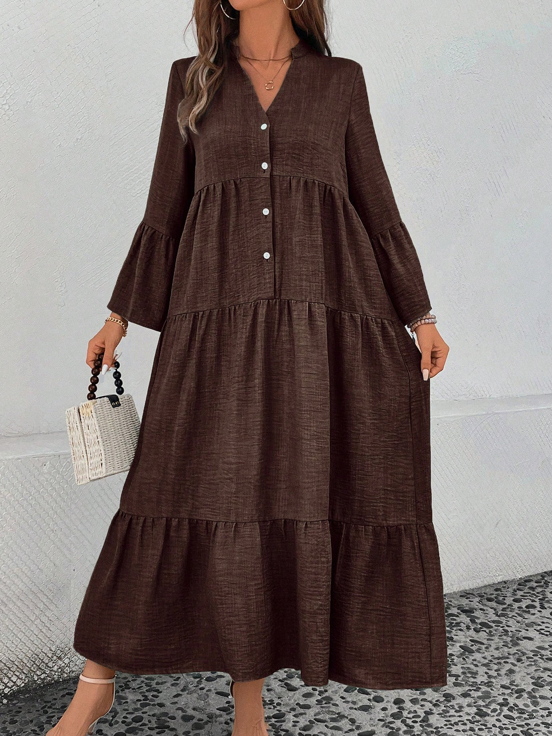 Get ready to show off your effortless holiday elegance with our Chic Notched Neck Flare Sleeve Maxi Dress! Its chic design features a notched neck and flare sleeves, adding just the right touch of sophistication. Perfect for any holiday occasion, this dress will have you looking and feeling amazing!