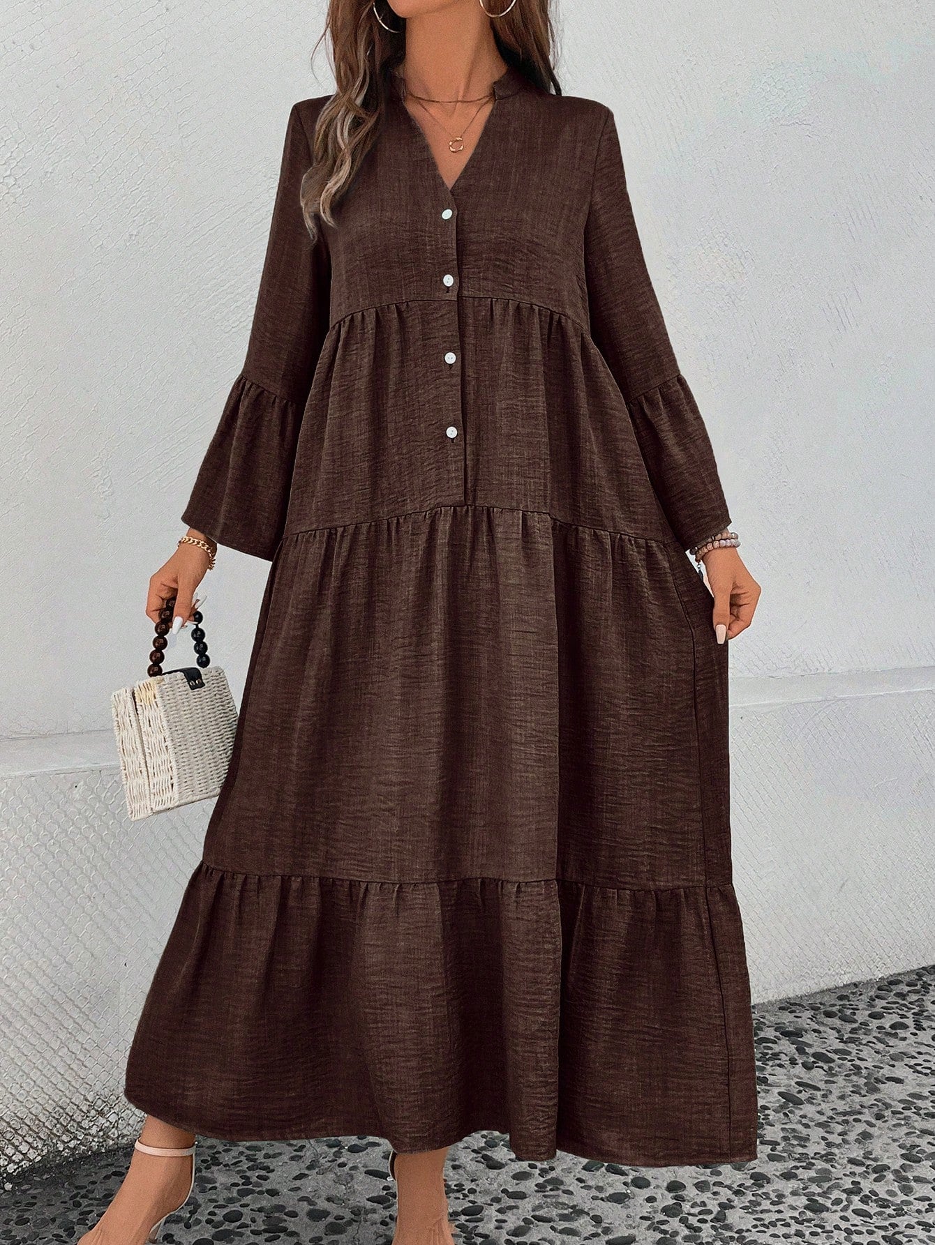 Get ready to show off your effortless holiday elegance with our Chic Notched Neck Flare Sleeve Maxi Dress! Its chic design features a notched neck and flare sleeves, adding just the right touch of sophistication. Perfect for any holiday occasion, this dress will have you looking and feeling amazing!