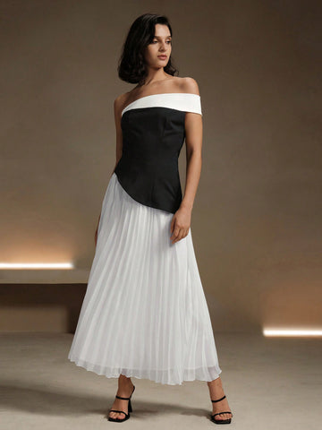 Slip into effortless elegance with this chic off-shoulder midi dress in classic black and white. The pleated detailing adds a touch of playfulness to this sophisticated look. Perfect for any occasion, this dress will make you stand out in style.