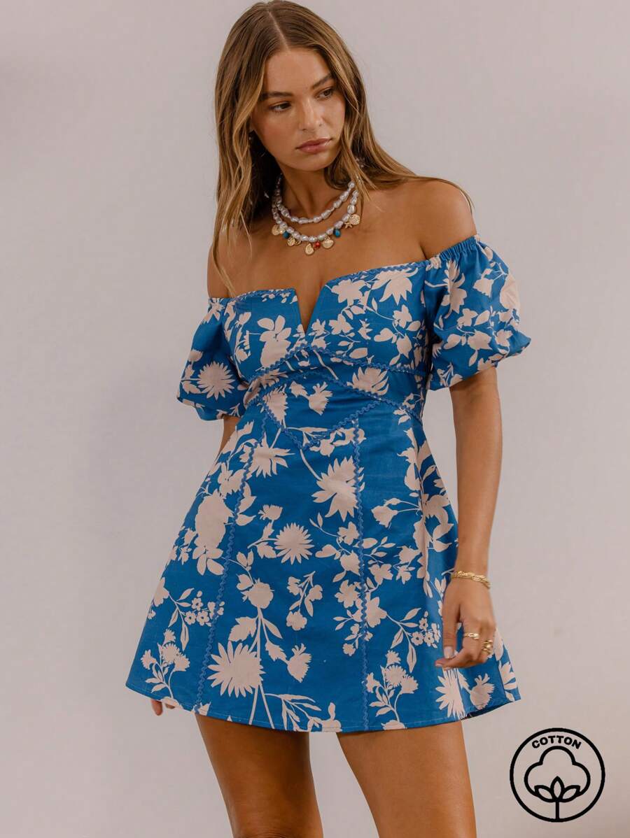 Effortless elegance meets playful style with this off-shoulder floral print mini dress. The romantic floral design and flattering off-shoulder neckline create a chic, feminine silhouette perfect for warm-weather outings, casual dates, or weekend adventures. Lightweight and breathable fabric ensures all-day comfort, while the mini length offers a modern, trendy look. 
