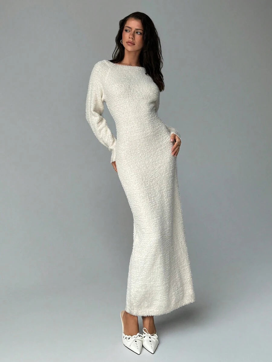 Slip into cozy elegance with this oversized sweater dress that's basically a warm hug you can wear. The off-shoulder neckline adds a flirty touch while the relaxed fit keeps things comfy and effortless—perfect for those lazy autumn mornings or winter hangouts. Layer it with your favorite boots and a belt to dress it up, or go full comfort mode with sneakers and a coffee in hand. This versatile piece transitions seamlessly from casual weekends to laid-back office vibes, making it the sweater dress that does 
