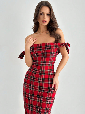 Experience effortless elegance this Christmas in our Chic Off-Shoulder Plaid Midi Dress. With its off-shoulder neckline and flattering midi length, this dress exudes class and sophistication. The plaid pattern adds a touch of timeless charm, making it the perfect choice for any holiday occasion. Elevate your style and spread holiday cheer with this must-have dress!
