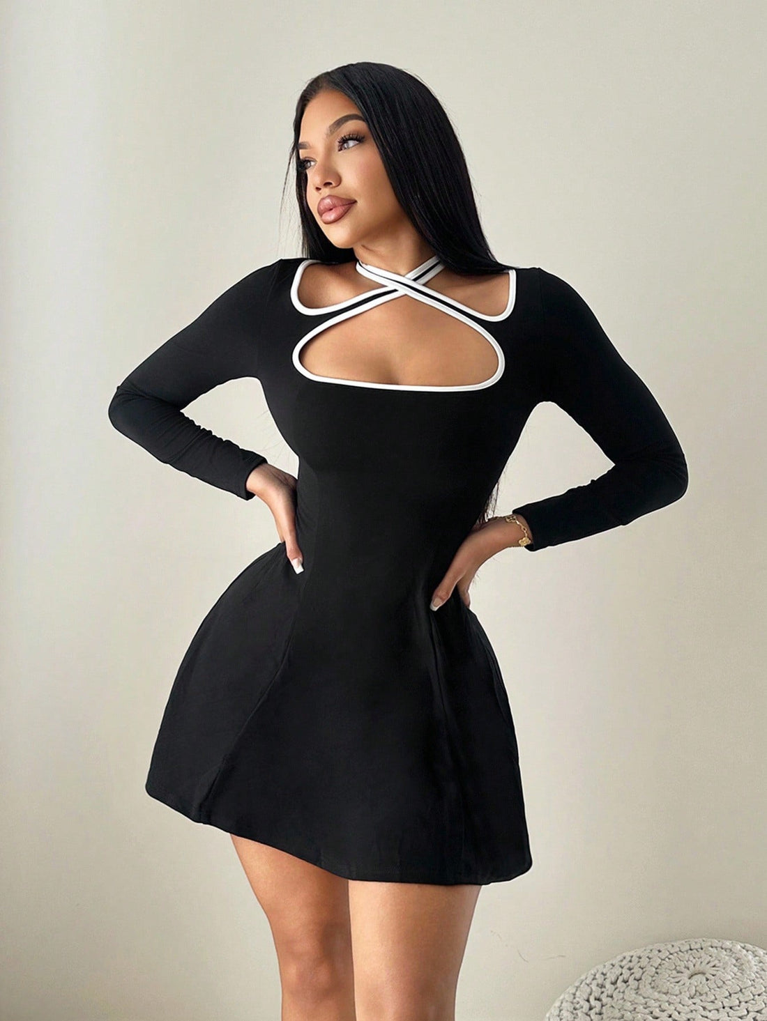 Elevate your autumn wardrobe with this charming off-shoulder dress that effortlessly blends sophistication with casual comfort. The romantic tie-up neckline and flowing long sleeves create an enchanting silhouette, while the princess split adds a playful touch of movement and flair. Perfect for weekend adventures, coffee dates, or cozy fall gatherings, this versatile piece transitions seamlessly from day to night. The off-shoulder design flatters every frame, making you feel confident and fabulous no matter