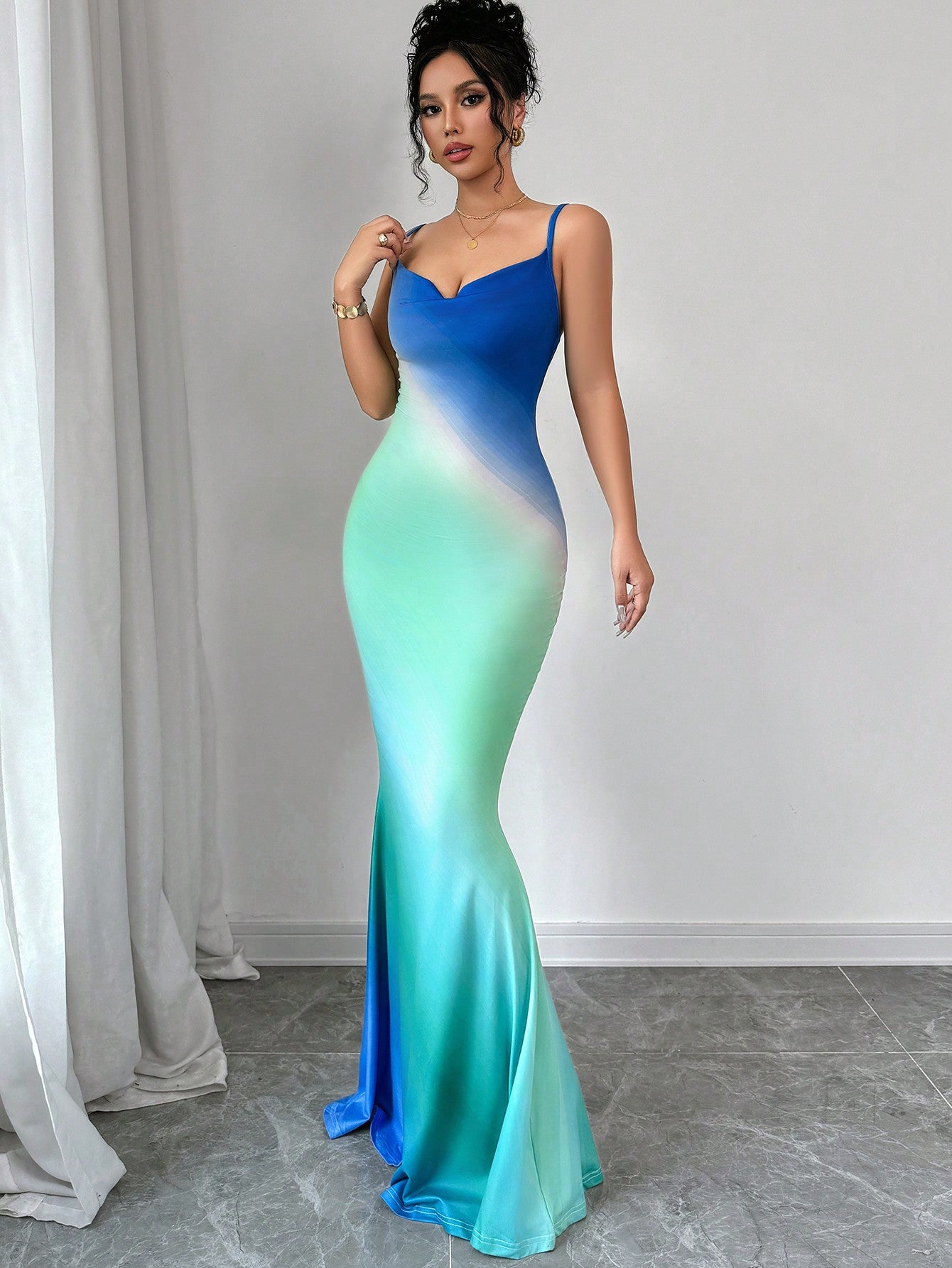 Step into summer with style in our Chic Ombre Fishtail Dress! This elegant dress boasts a unique ombre design that transitions from light to dark, adding a touch of sophistication to your wardrobe. Perfect for any stylish woman looking to make a statement.
