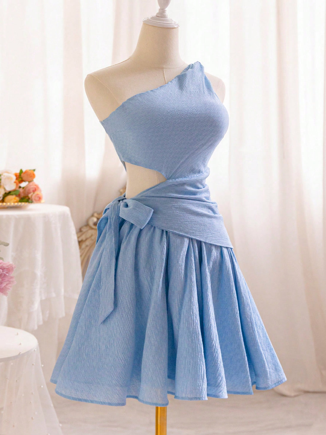 Elevate your style with our chic one-shoulder A-line dress! The elegant bow belt and stylish side slit make it perfect for graduation and summer events. Make a bold and fashionable statement with this versatile dress.