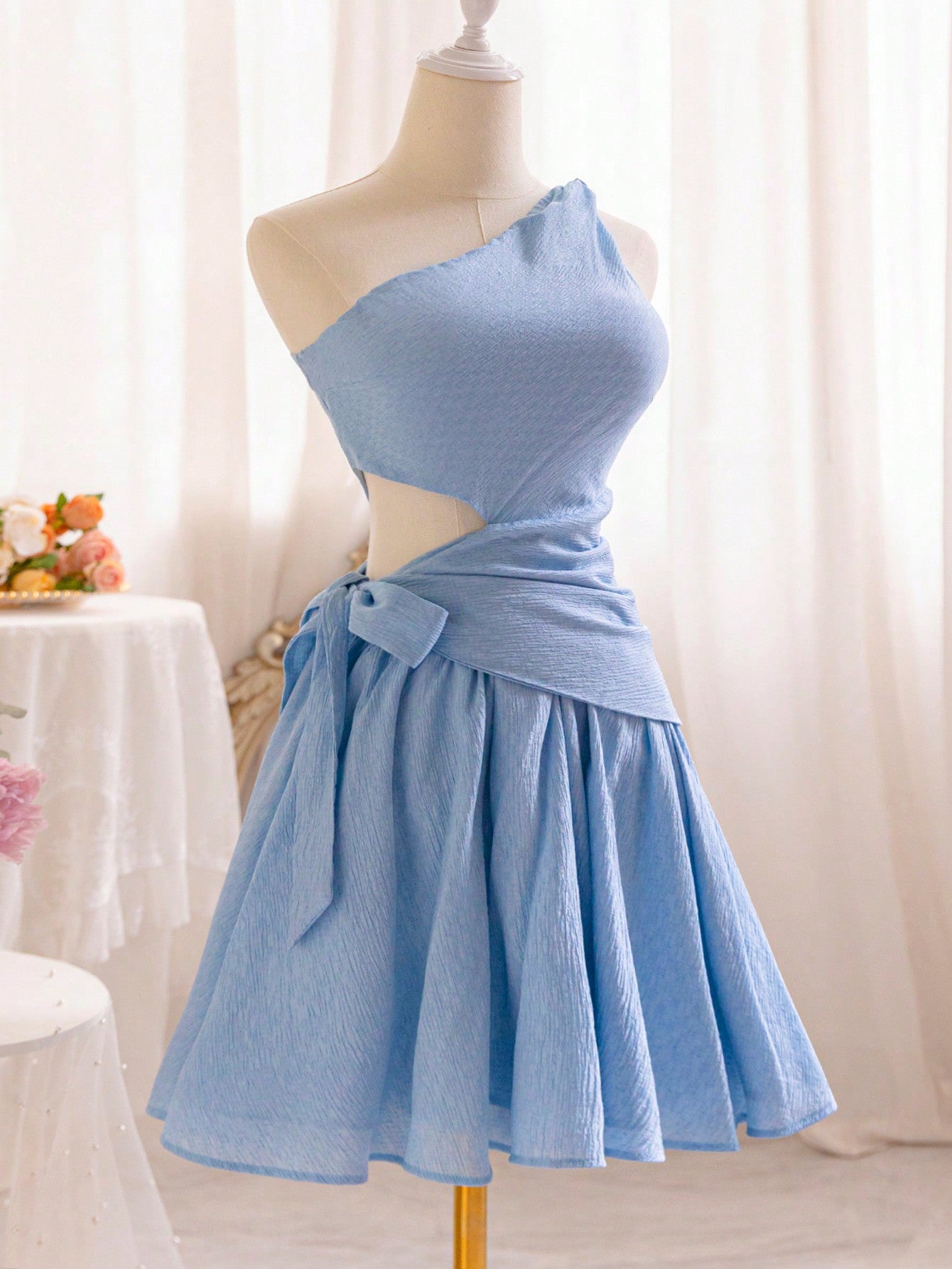 Elevate your style with our chic one-shoulder A-line dress! The elegant bow belt and stylish side slit make it perfect for graduation and summer events. Make a bold and fashionable statement with this versatile dress.