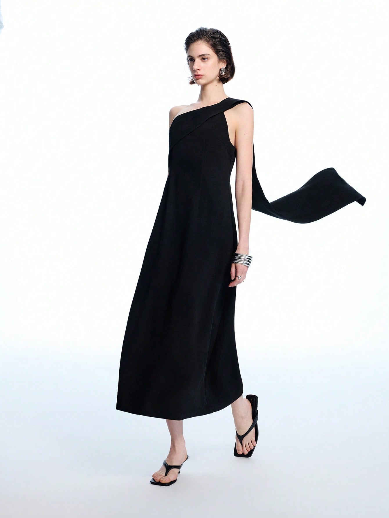 Step into the spotlight with this chic one-shoulder A-line midi dress, designed to turn heads at any spring or summer event. Its flattering silhouette dances with every move, making it the perfect pick for prom nights or elegant gatherings. Light, breezy, and effortlessly stylish, this dress promises to keep you comfortable while stealing the show. Ready to make memories? This dress is your new best friend.