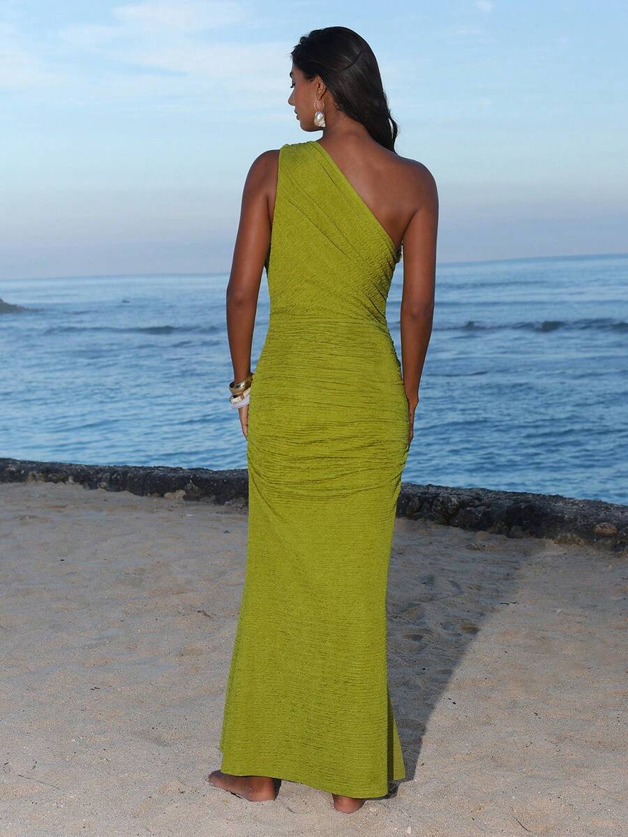 Back view of olive green one-shoulder ruched bodycon maxi dress for beach vacation styling