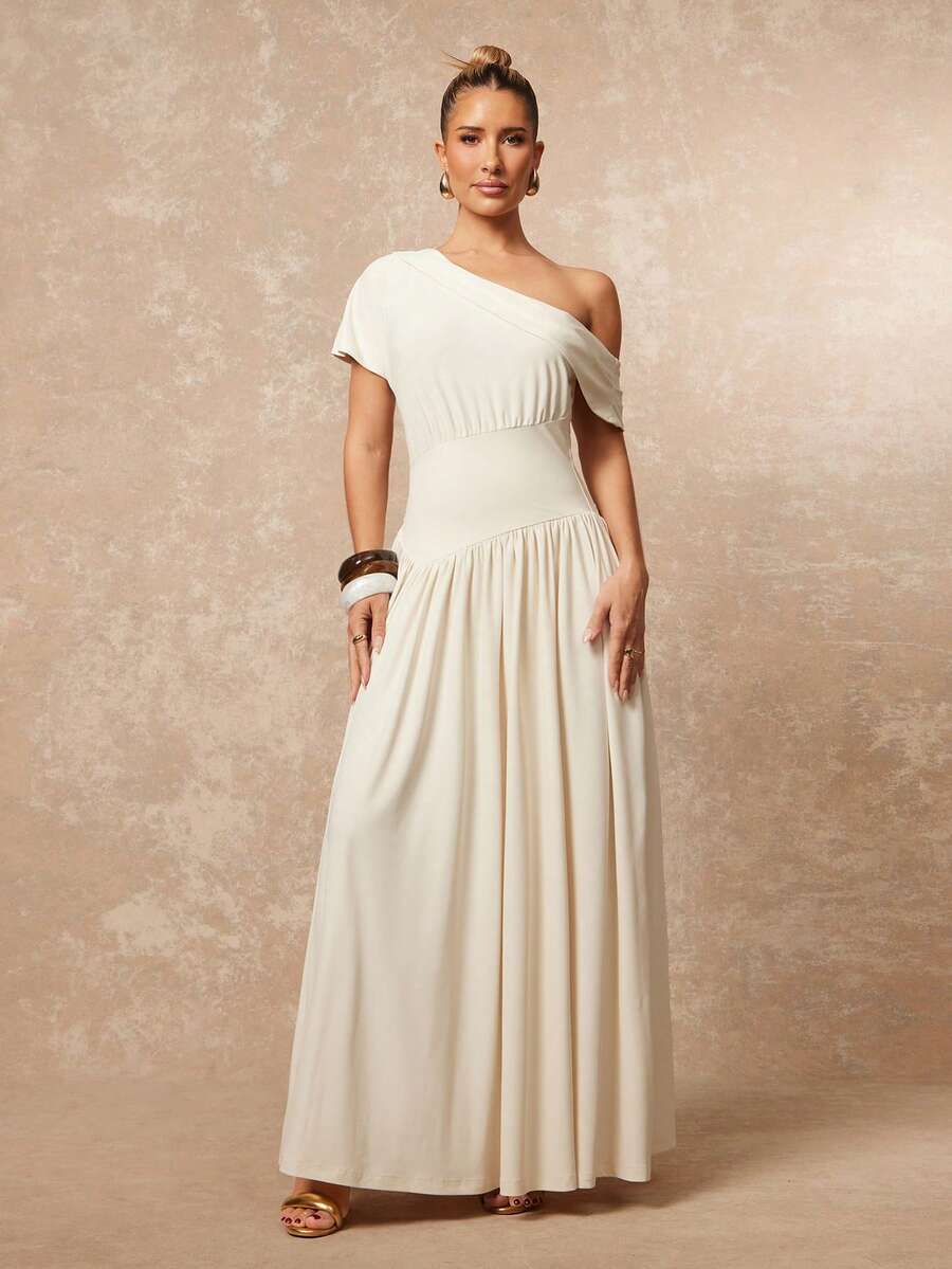 Elevate your formal wardrobe with this stunning one-shoulder cream maxi dress. Featuring an elegant draped bodice with asymmetrical neckline and graceful ruching, the dress flows into a flattering A-line silhouette with a high waistline. Crafted from a soft knitted fabric blend of 95% polyester and 5% elastane, it offers medium stretch for comfortable movement. The short batwing sleeves and flared hem add sophisticated dimension. Perfect for weddings, evening events, and special occasions. Hand wash or prof