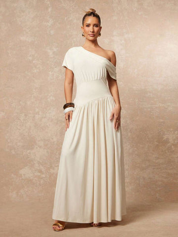 Elevate your formal wardrobe with this stunning one-shoulder cream maxi dress. Featuring an elegant draped bodice with asymmetrical neckline and graceful ruching, the dress flows into a flattering A-line silhouette with a high waistline. Crafted from a soft knitted fabric blend of 95% polyester and 5% elastane, it offers medium stretch for comfortable movement. The short batwing sleeves and flared hem add sophisticated dimension. Perfect for weddings, evening events, and special occasions. Hand wash or prof