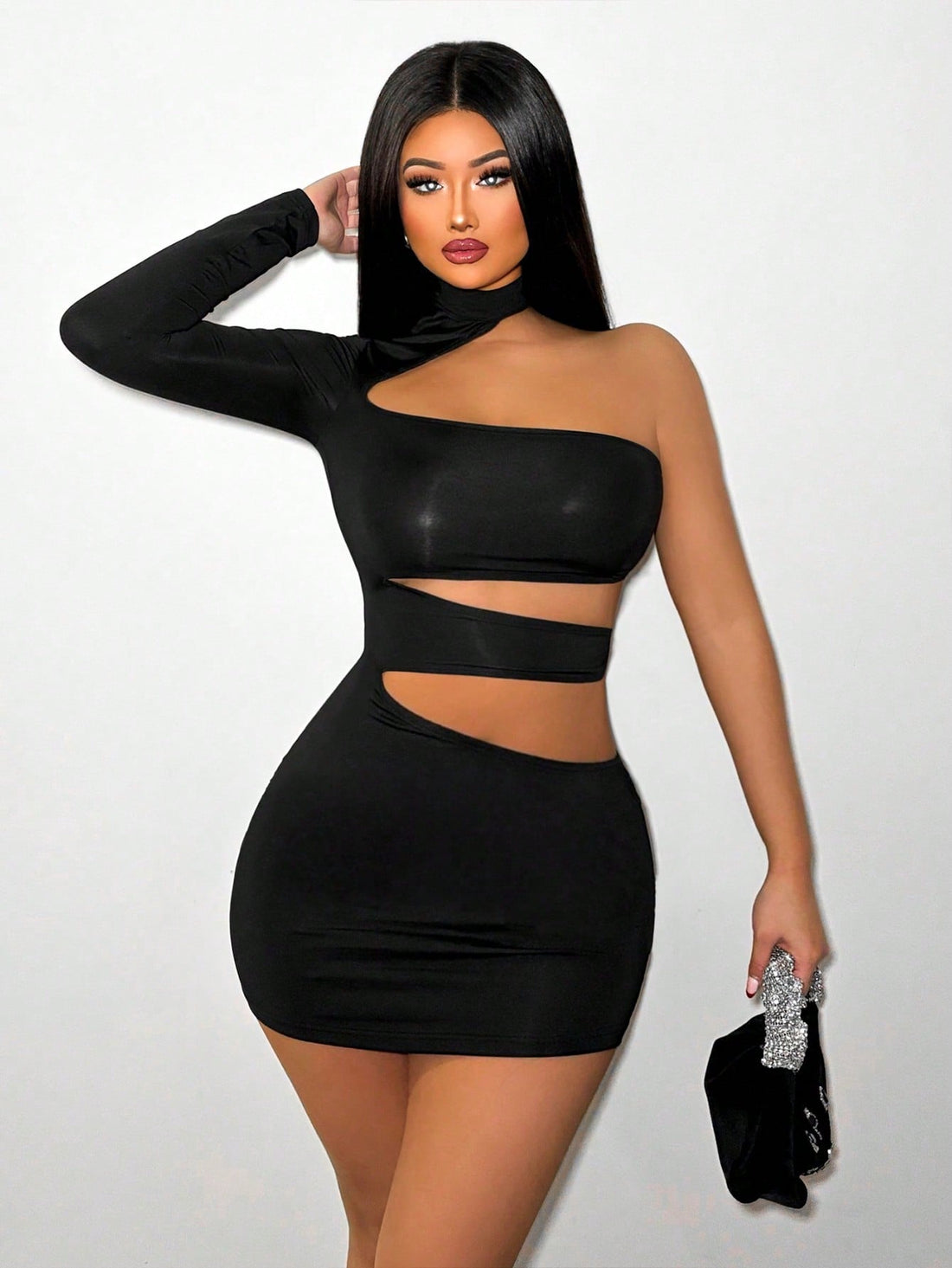 Make a bold fashion move this fall with this stunning one-shoulder dress that effortlessly blends elegance and edge. The asymmetrical neckline draws all the right attention, while strategically placed hollow-out details add an intriguing modern twist. Long sleeves keep you cozy as temperatures drop, making it the perfect layering piece for transitional weather. Whether you're heading to brunch, a night out, or a casual gathering, this versatile dress proves that chic doesn't have to be complicated—just conf